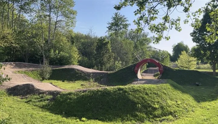 Dirt jumps and riding features at Riverside Bike Park.