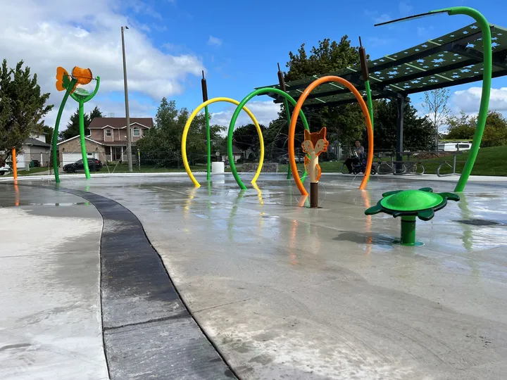 Ground-level view of Lions Can-Amera Park Splash Pad - Closed