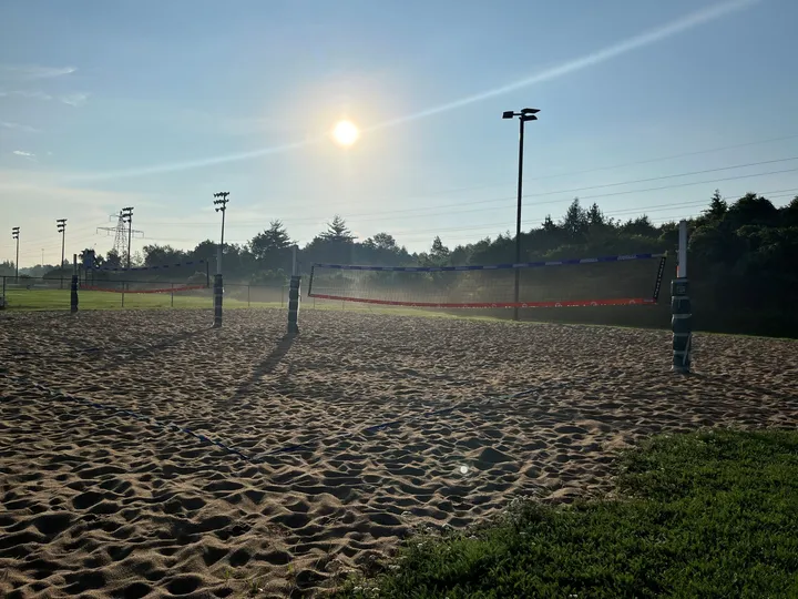 Ground-level view of Riverside Park - Beach Volleyball Courts 1-4